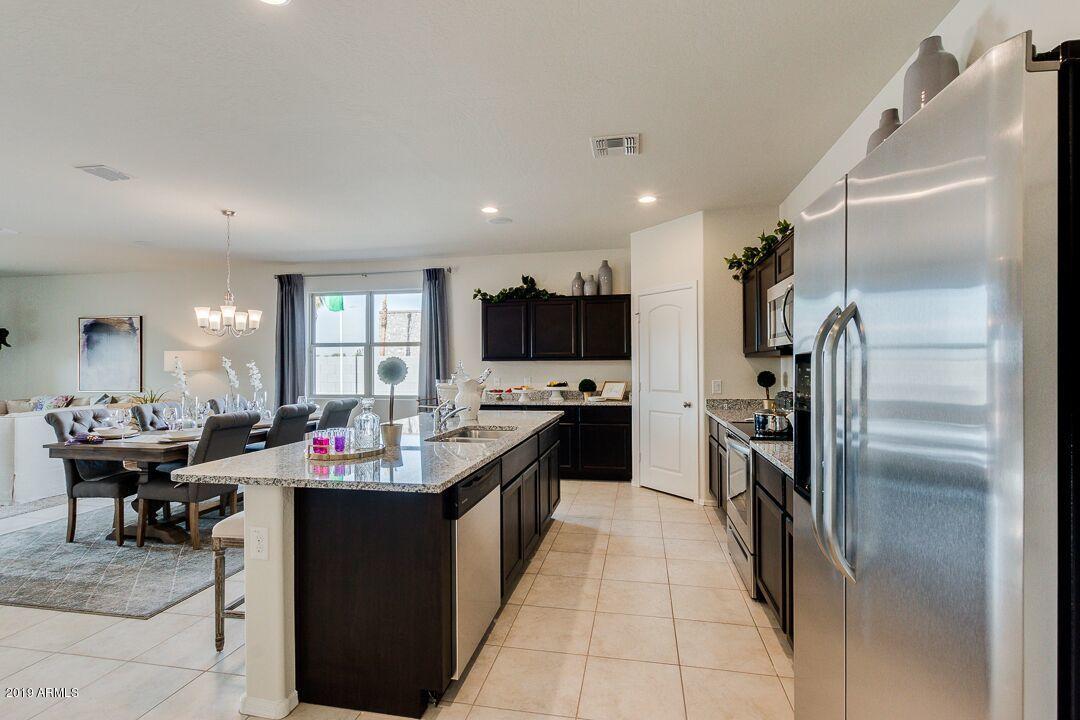 25579 West Coles Road Buckeye, AZ 85326 - Photo 2 of 35 sidekitchen