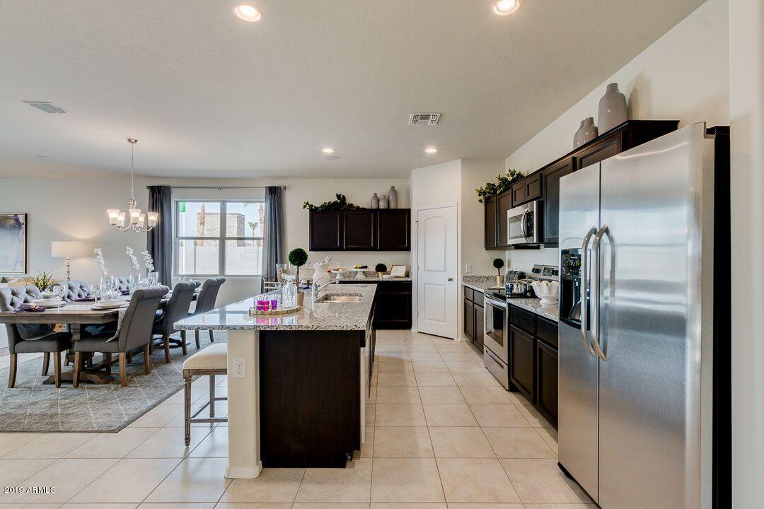 25579 West Coles Road Buckeye, AZ 85326 - Photo 4 of 35 sidekitchenanddining