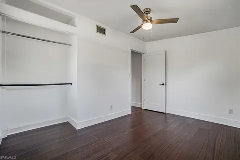 a bathroom with a sink a toilet and vanity