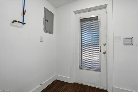 a view of empty room with windows and yard