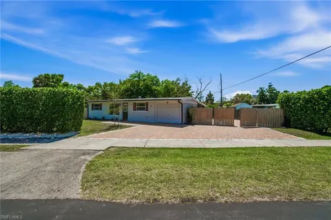 a house with yard in front of it