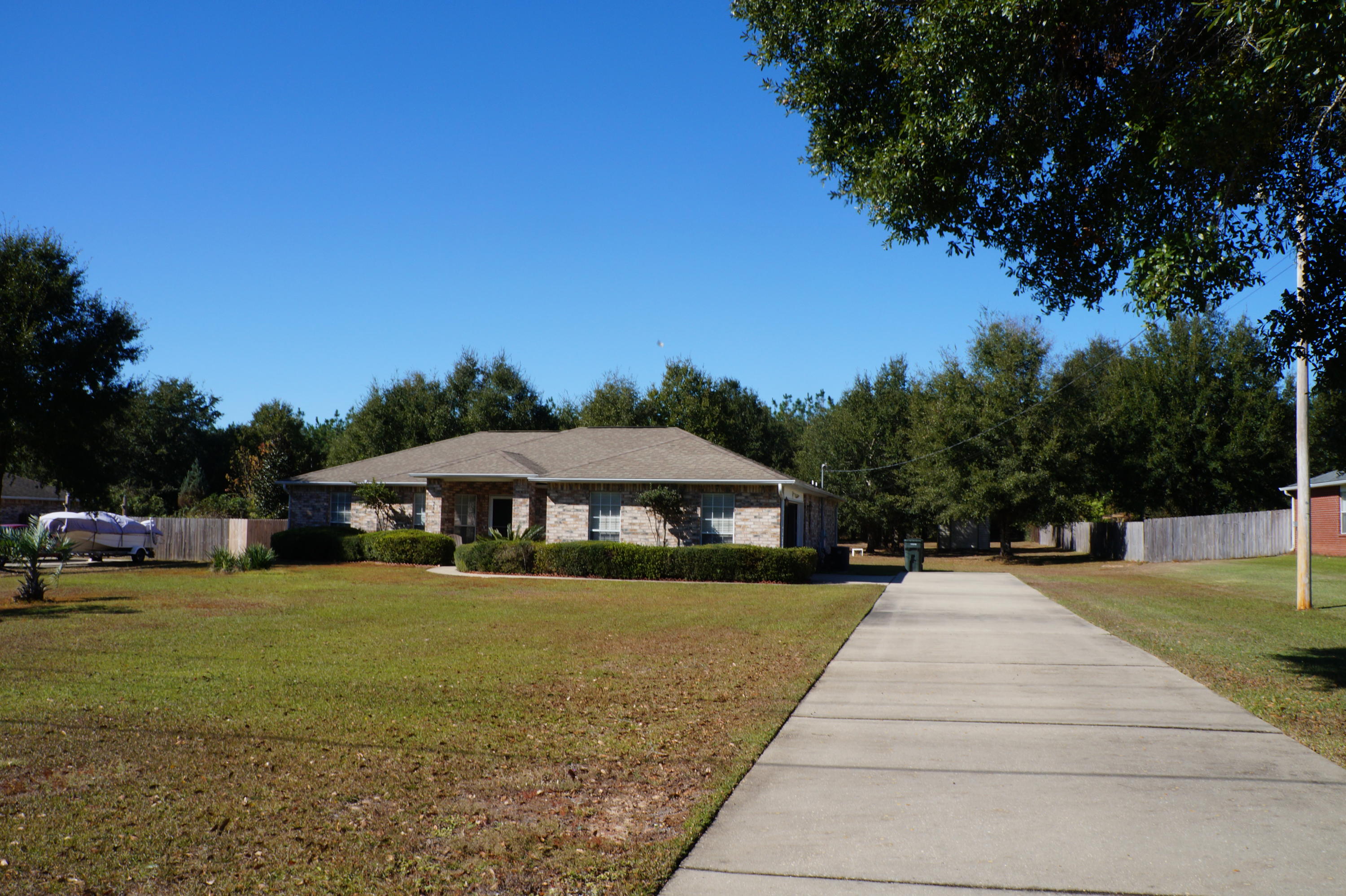 5534 Mulat Road Milton, FL 32583 - Photo 3 of 67 a view of a outdoor space with garden