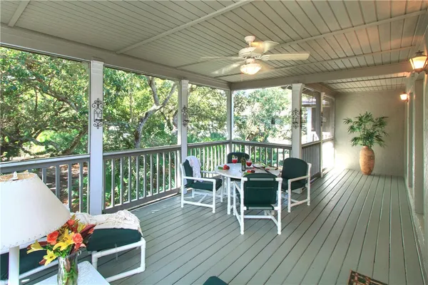 a view of a dining room and wooden floor