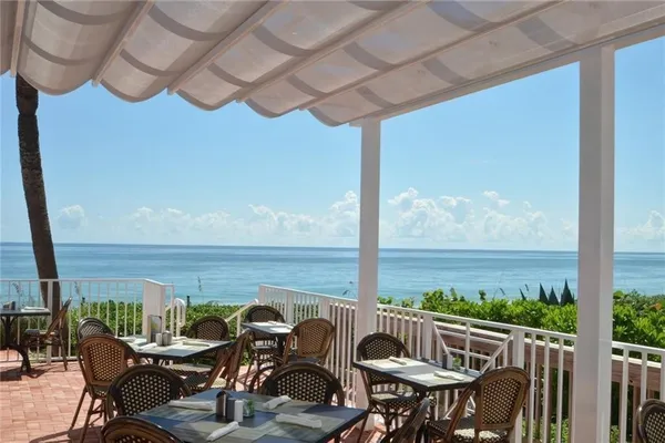 a view of an outdoor space with furniture