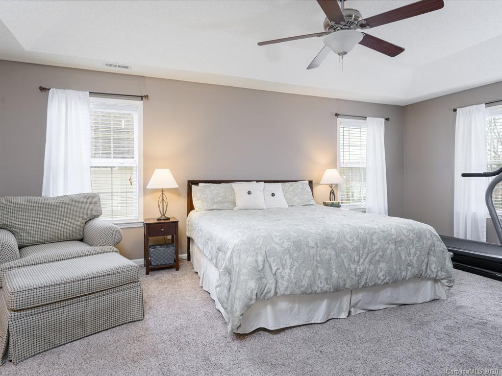 180 Wildbriar Road, Unit 12 Fletcher, NC 28732 - Photo 16 of 33 a spacious bedroom with a bed and window