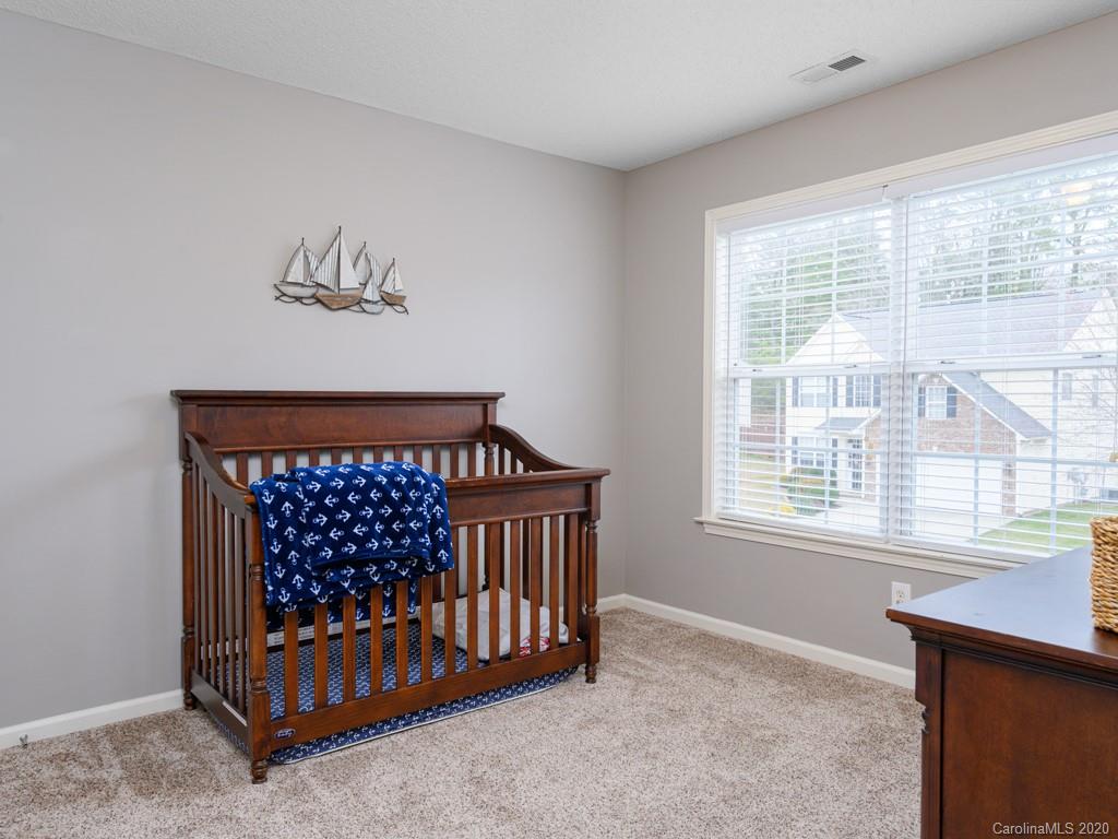 180 Wildbriar Road, Unit 12 Fletcher, NC 28732 - Photo 25 of 33 a view of wooden floor and windows in a room