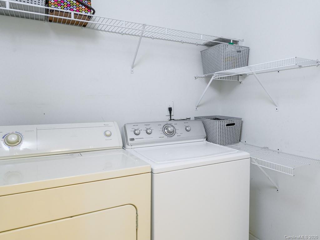 180 Wildbriar Road, Unit 12 Fletcher, NC 28732 - Photo 27 of 33 a utility room with dryer and washer