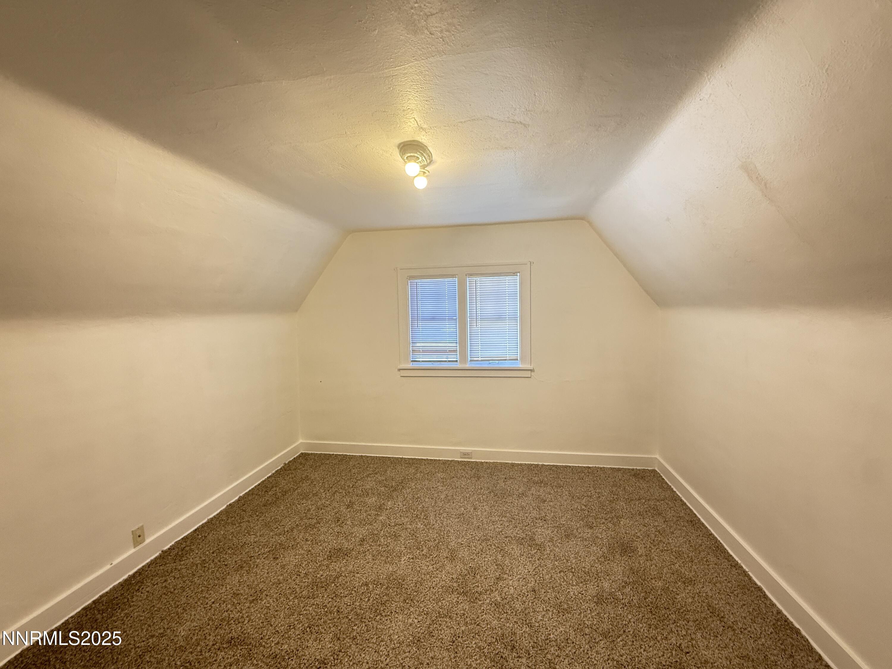 531 East Taylor Street Reno, NV 89502 - Photo 13 of 15 an empty room with a empty space and window