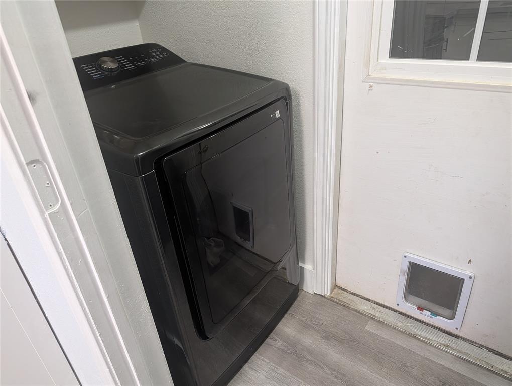 211 McAfee Street Mabank, TX 75147 - Photo 16 of 20 a view of washer and dryer