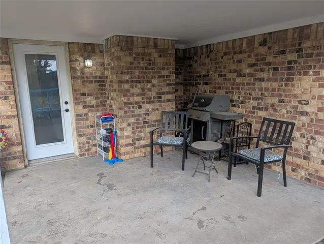 a view of livingroom with furniture and closet
