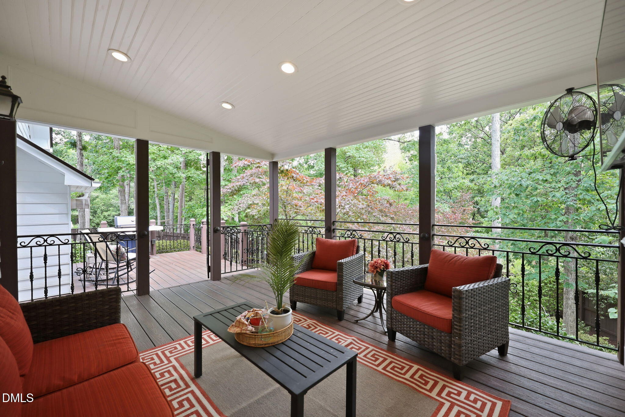 1716 Farmington Grove Drive Raleigh, NC 27614 - Photo 30 of 41 a living room with furniture and floor to ceiling windows