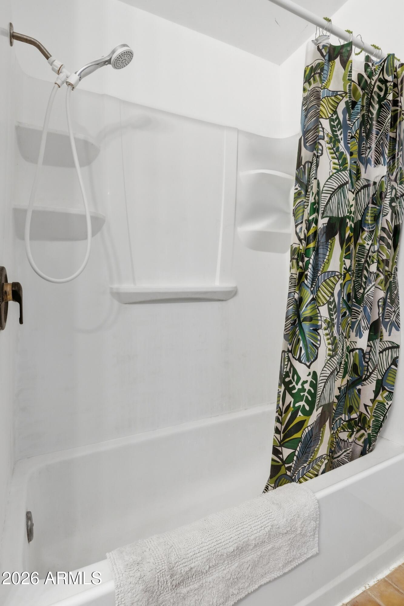 8135 West Gibson Ranch Road Payson, AZ 85541 - Photo 13 of 43 a bathroom with a bathtub and shower