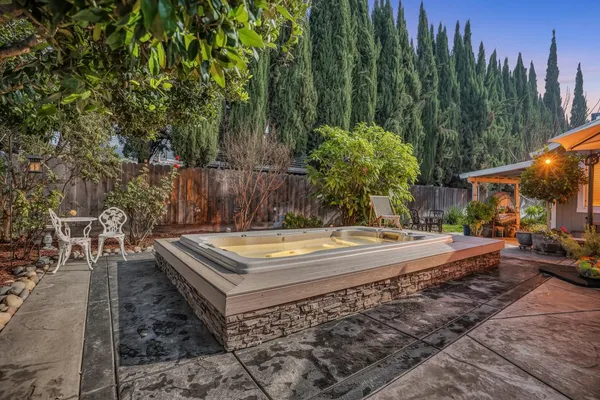 a view of a swimming pool with a patio