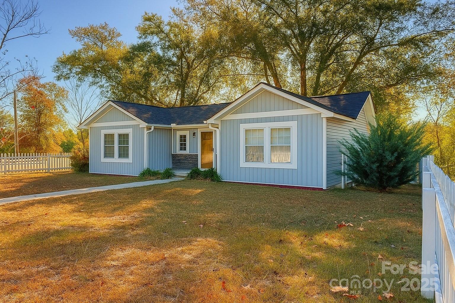 1073 Jones Road Kershaw, SC 29067 - Photo 2 of 18 a front view of a house with a garden