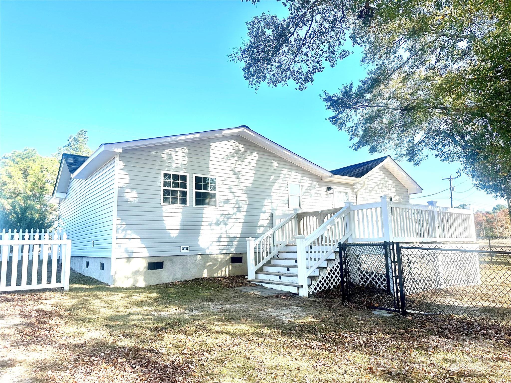 1073 Jones Road Kershaw, SC 29067 - Photo 6 of 18 a view of a house with a yard and sitting area
