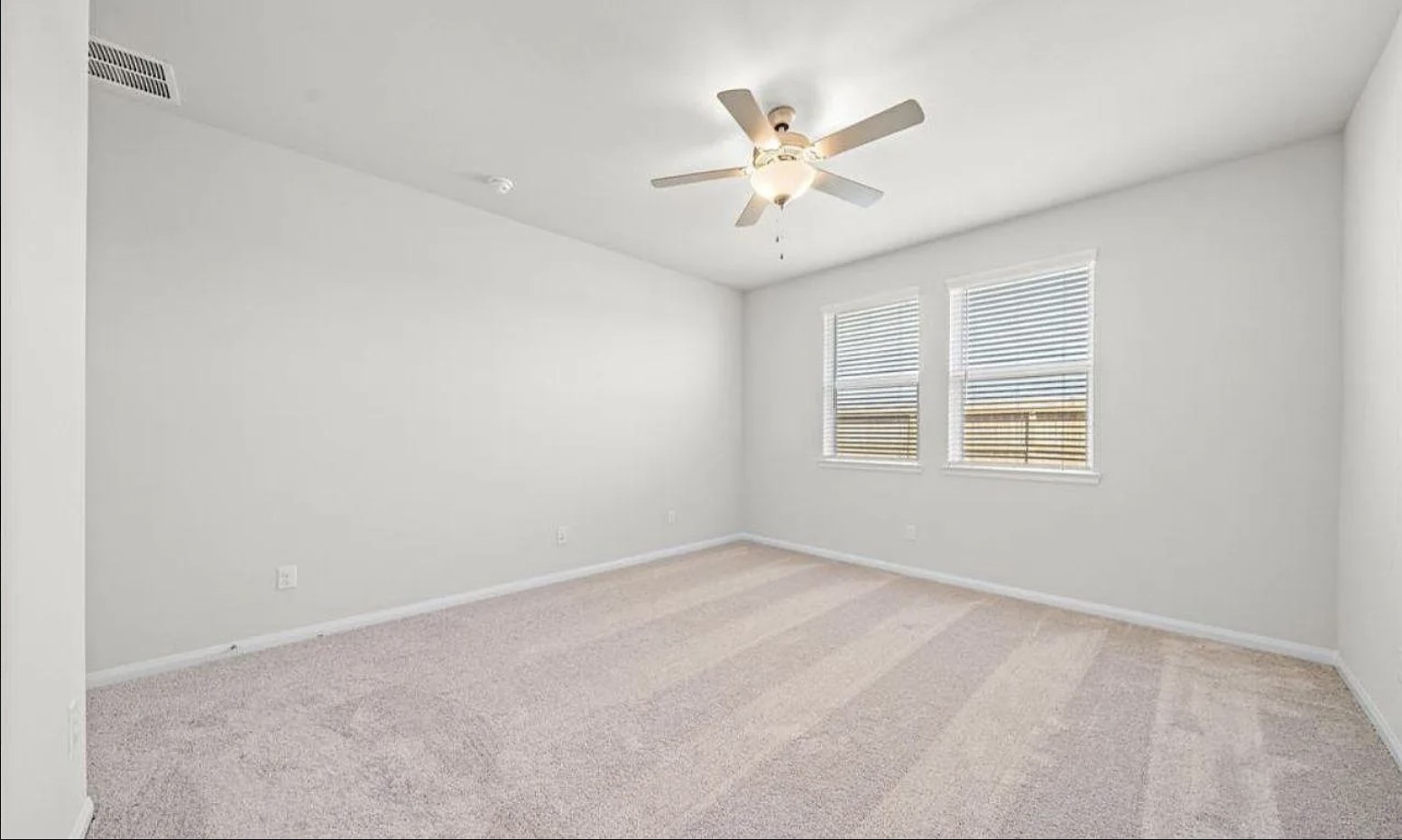 5631 Giving Grace Way Houston, TX 77048 - Photo 7 of 10 a view of an empty room with a window