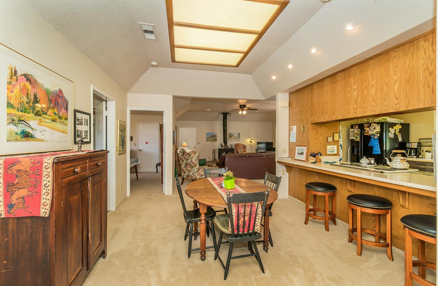 13016 Violet Lane Clovis, CA 93619 - Photo 11 of 41 a view of a dining room with furniture