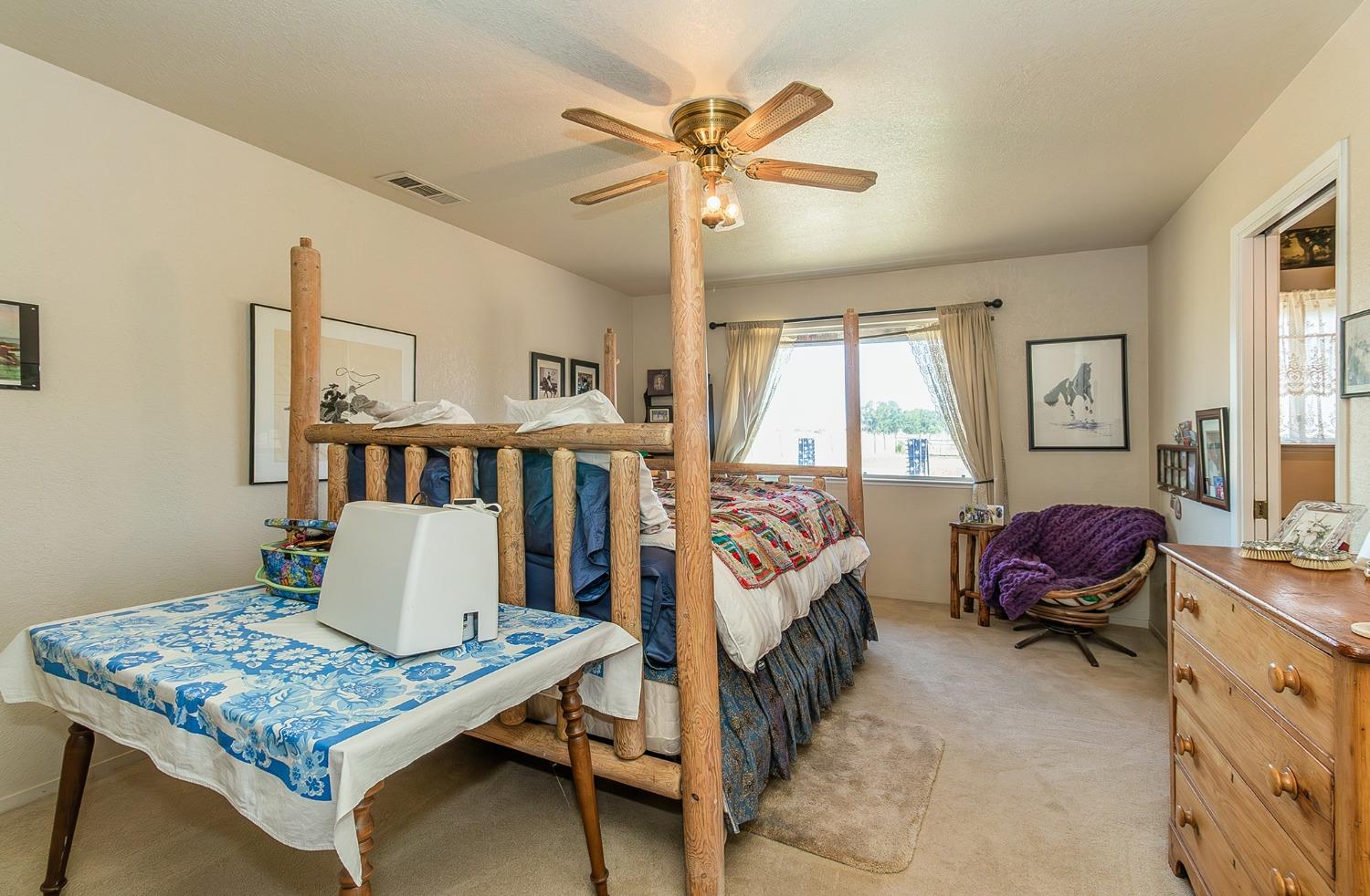 13016 Violet Lane Clovis, CA 93619 - Photo 16 of 41 a living room with furniture and a rug