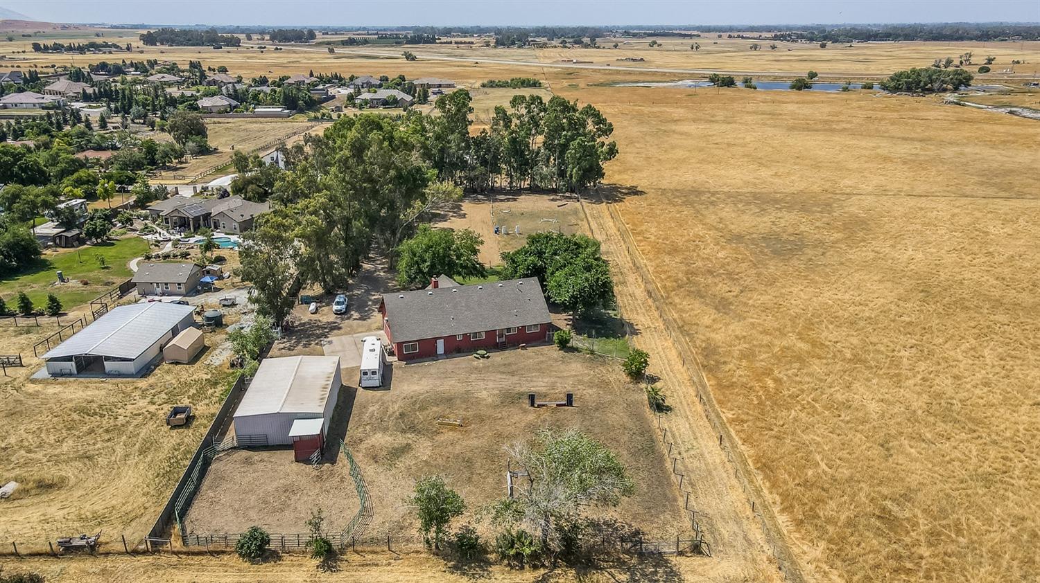 13016 Violet Lane Clovis, CA 93619 - Photo 40 of 41 an aerial view of residential houses with outdoor space