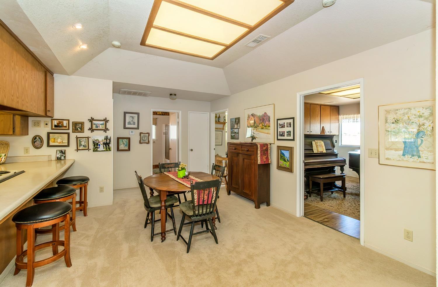 13016 Violet Lane Clovis, CA 93619 - Photo 9 of 41 a view of a dining room with furniture