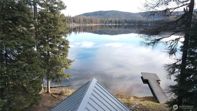 a view of a backyard of the house