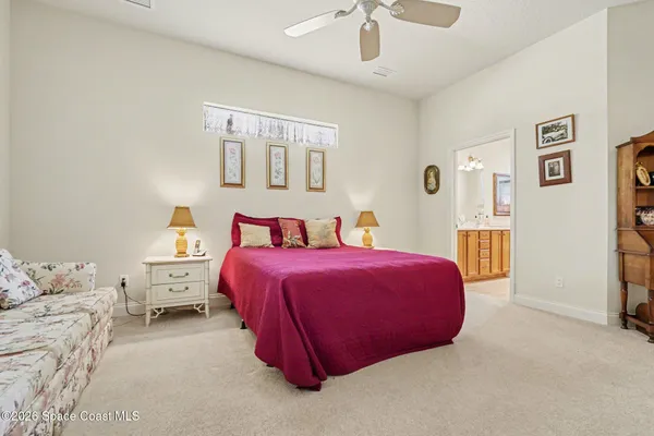 a view of a lake with houses in the back