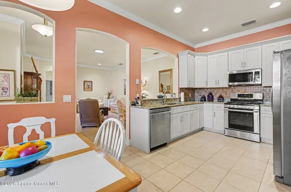 a bathroom with a tub and a shower