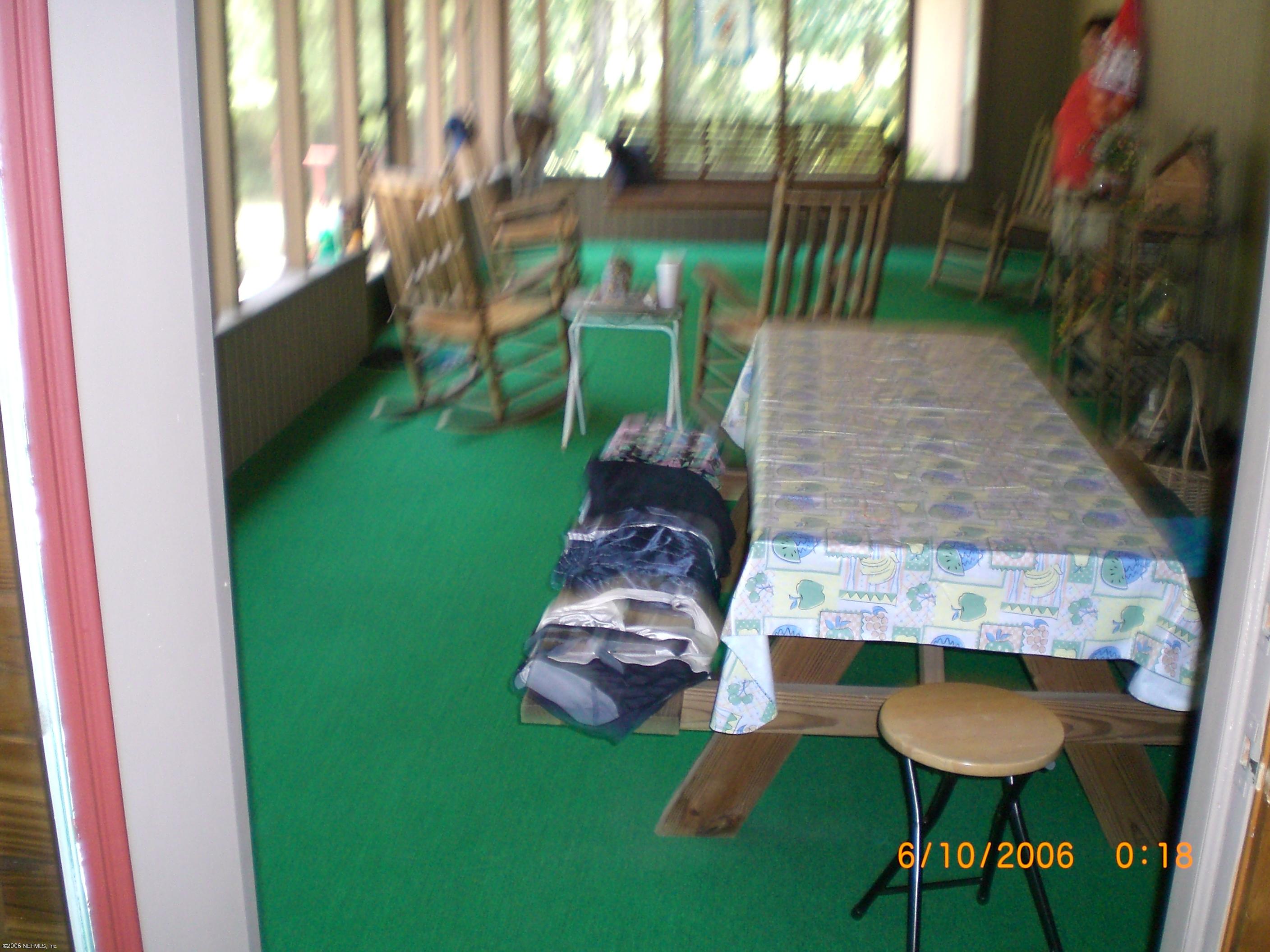 6996 Bob Kirkland Road Macclenny, FL 32063 - Photo 8 of 11 BACK PORCH ENCLOSED