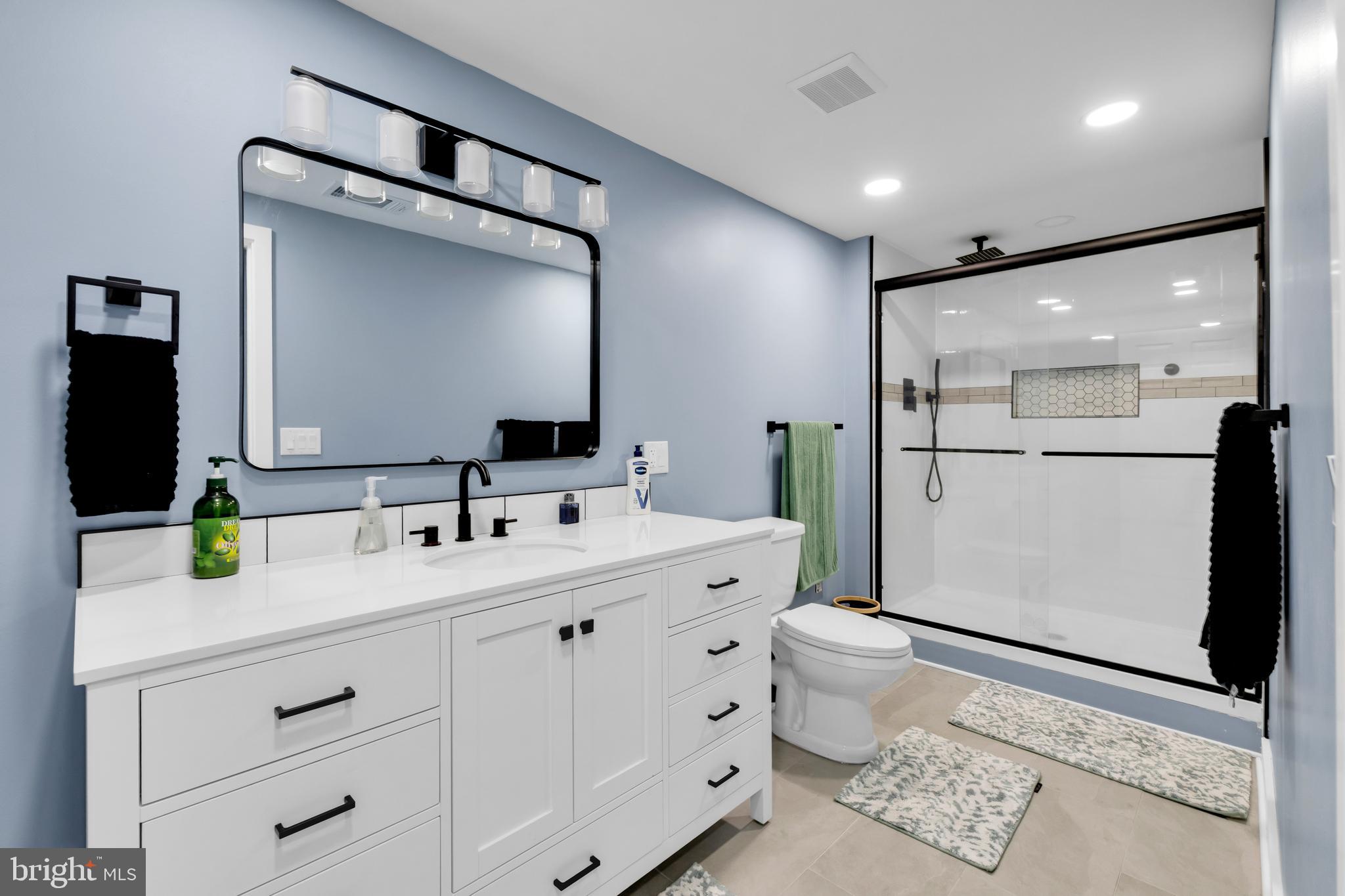 2840 Jacksonville Road Bethlehem, PA 18017 - Photo 37 of 57 a bathroom with a double vanity sink mirror and toilet