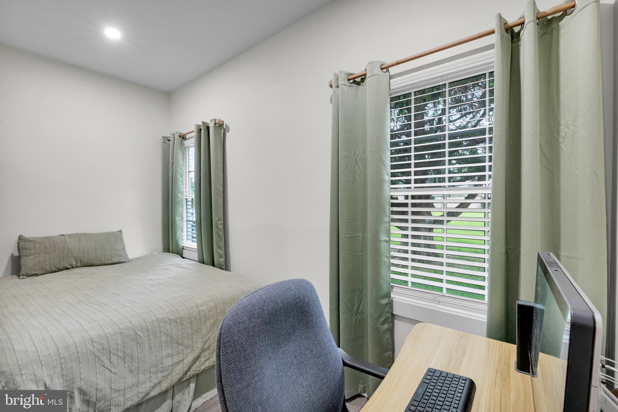 2840 Jacksonville Road Bethlehem, PA 18017 - Photo 57 of 57 a bedroom with a bed and a chair