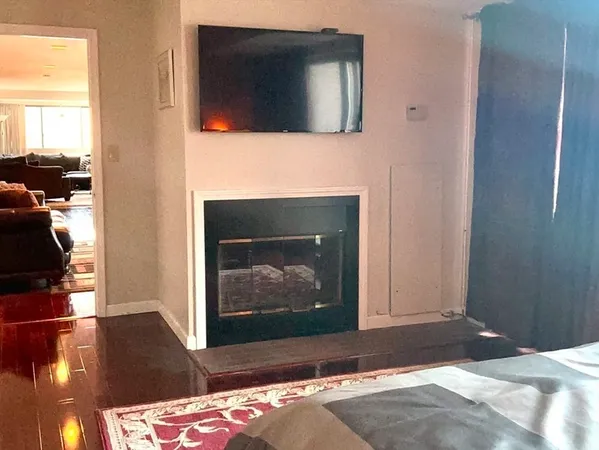 a living room with a fireplace