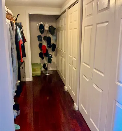 a view of entryway with wooden floor