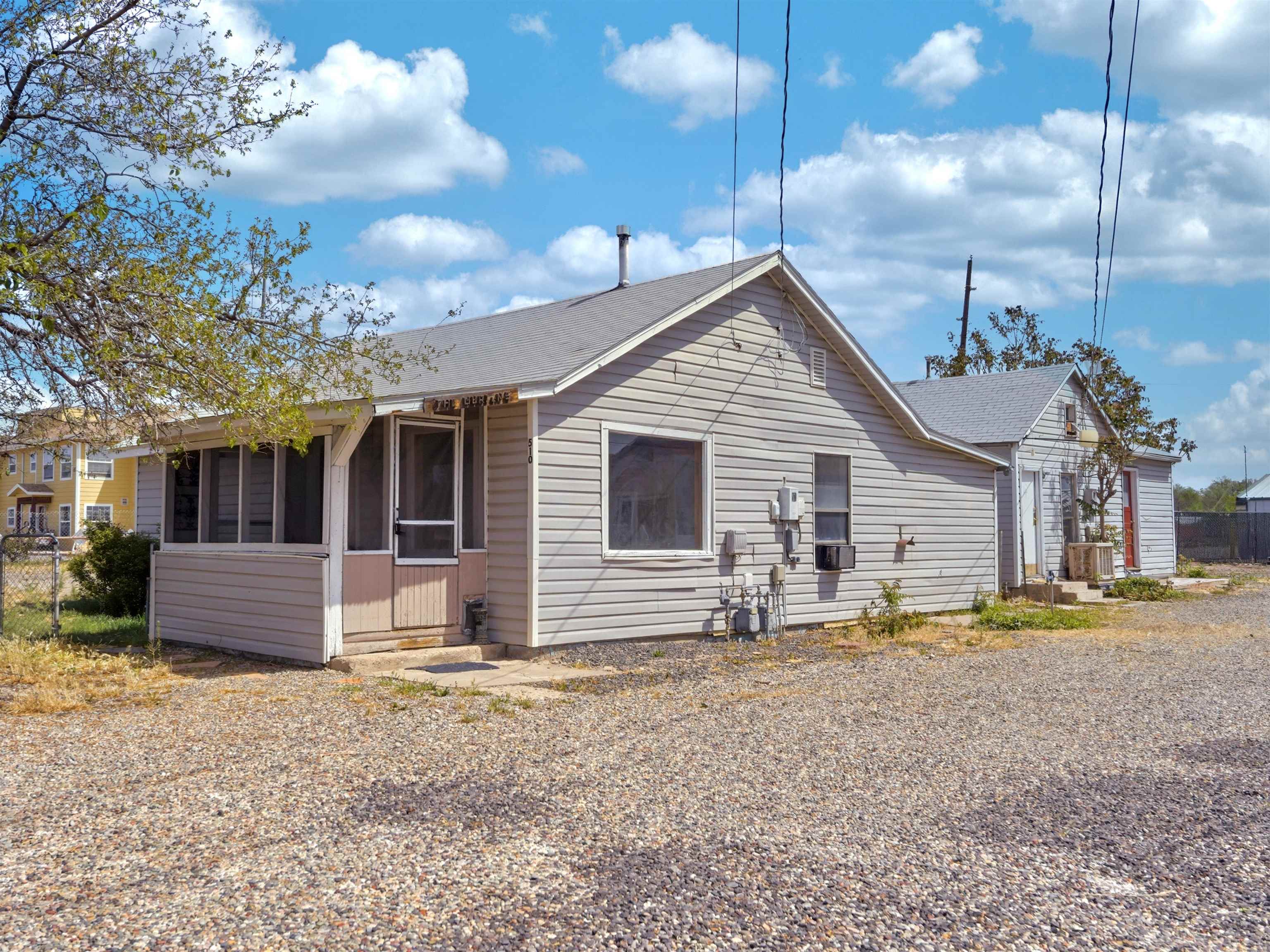 510 Court Road, Unit 1 1 Grand Junction, CO 81501 - Photo 1 of 29 a view of a house with backyard and sitting area