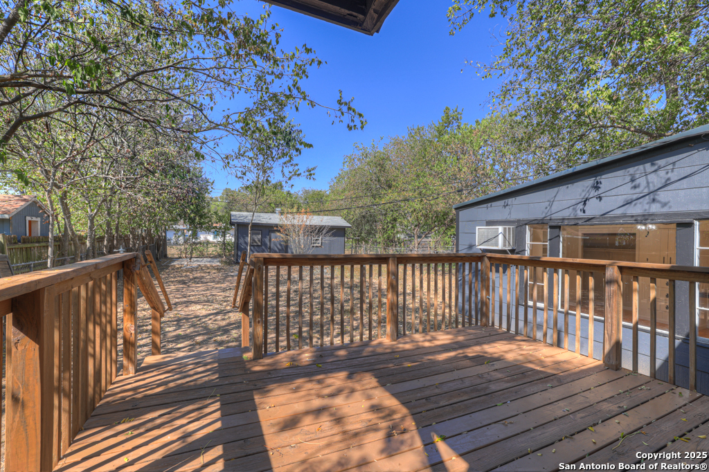 511 Wright Avenue Schertz, TX 78154 - Photo 17 of 23 a view of a wooden deck with a patio