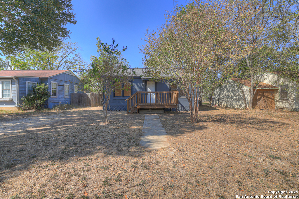 511 Wright Avenue Schertz, TX 78154 - Photo 2 of 23 a front view of a house with a yard and garage