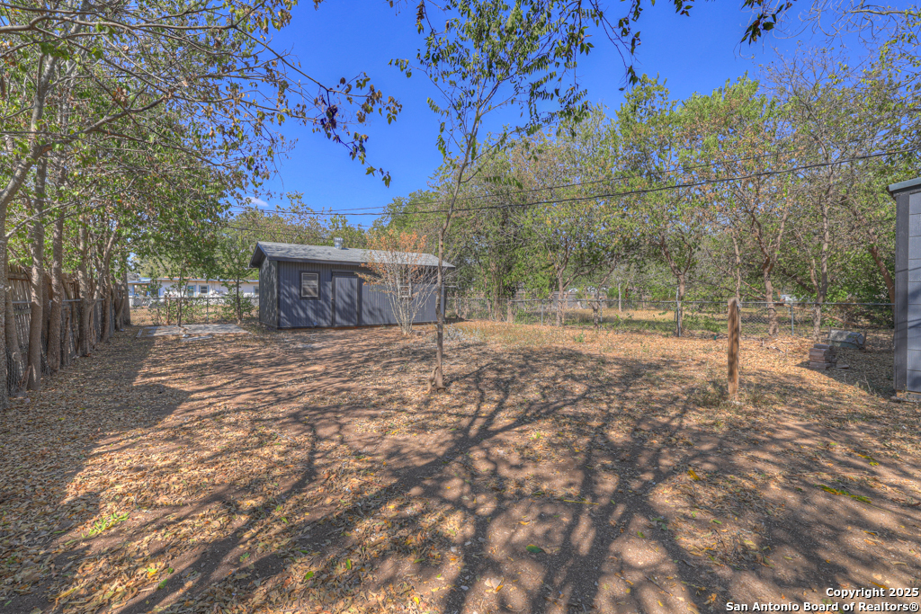 511 Wright Avenue Schertz, TX 78154 - Photo 21 of 23 a view of house with a yard