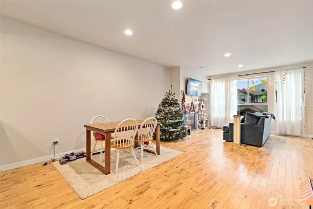 a room with furniture and a wooden floor