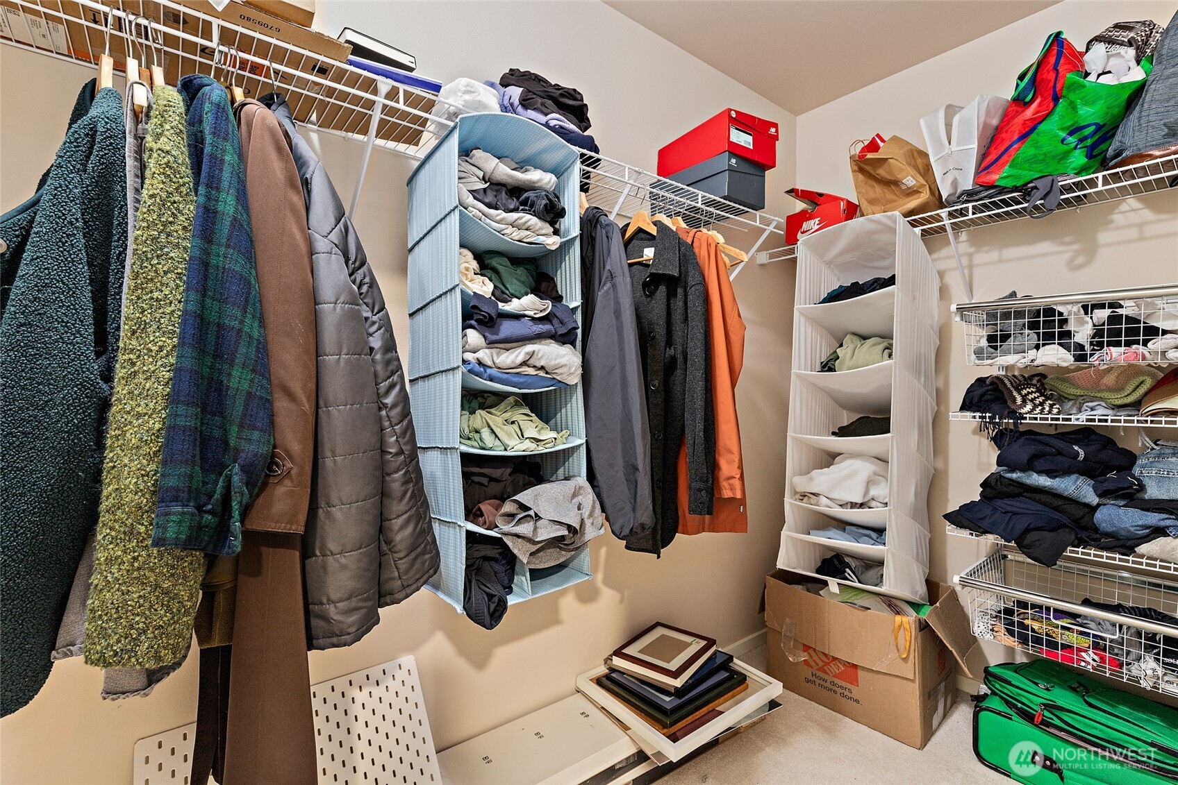 16522 1st Park Southeast Bothell, WA 98012 - Photo 21 of 29 a view of walk in closet with clothes and shoes