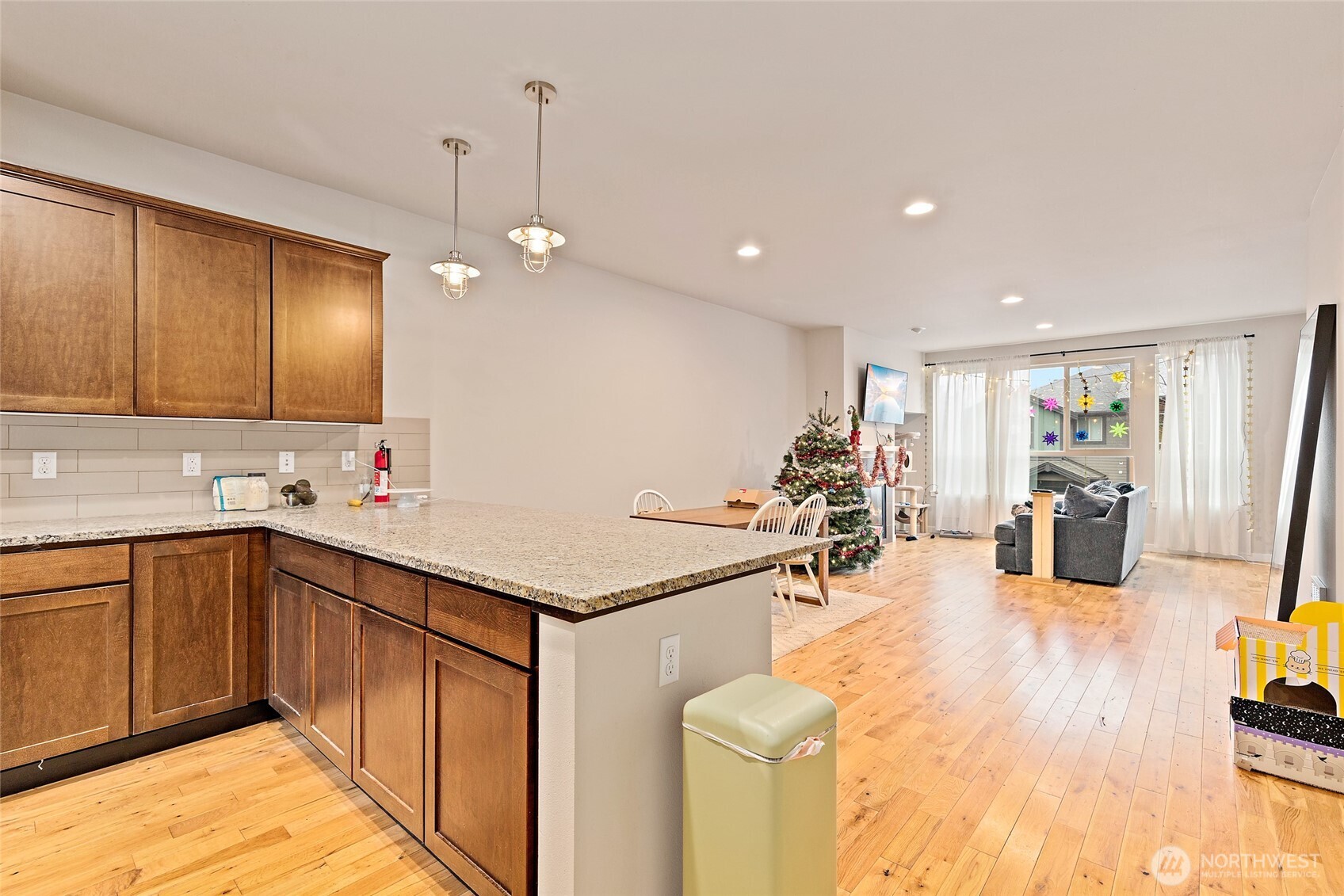 16522 1st Park Southeast Bothell, WA 98012 - Photo 7 of 29 a kitchen with a sink cabinets and wooden floor