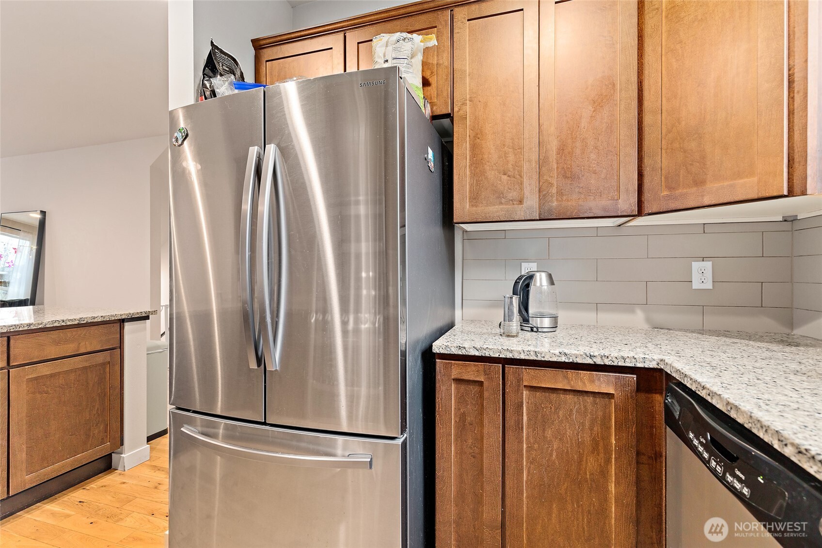 16522 1st Park Southeast Bothell, WA 98012 - Photo 9 of 29 a kitchen with stainless steel appliances granite countertop a refrigerator and a sink
