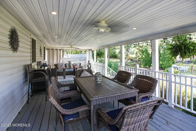 a view of a patio filled with furniture