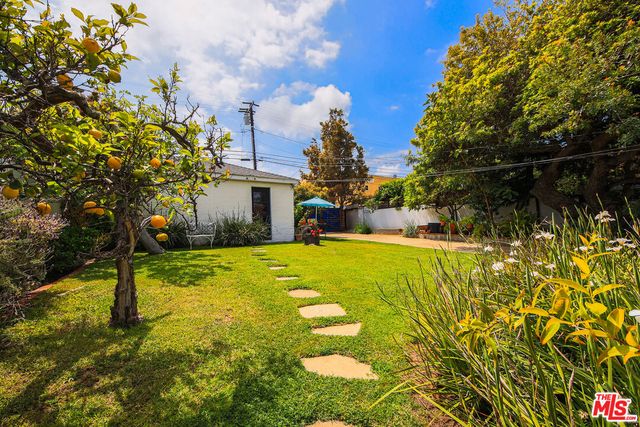 a view of an chairs and table in the patio