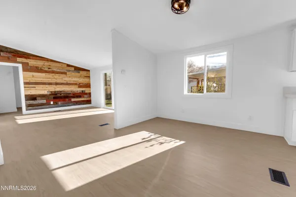 a view of an empty room with window