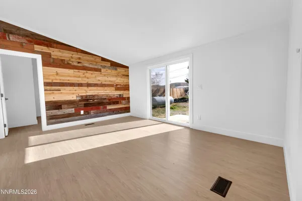 a view of entryway with wooden floor
