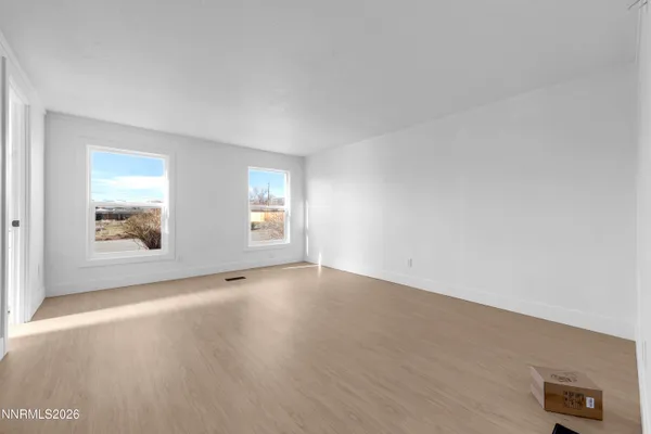 an empty room with window