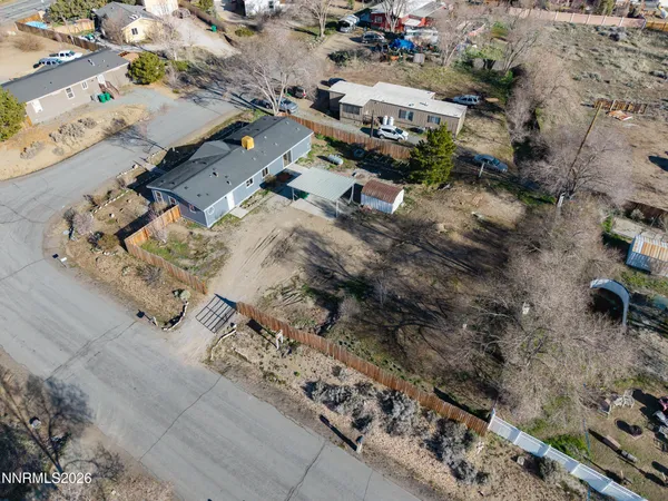 an aerial view of residential house with outdoor space