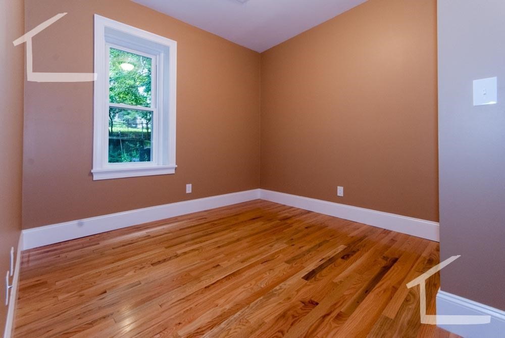 6 Lothian Road, Unit 3 Boston, MA 02135 - Photo 8 of 10 a view of a room with wooden floor and fan