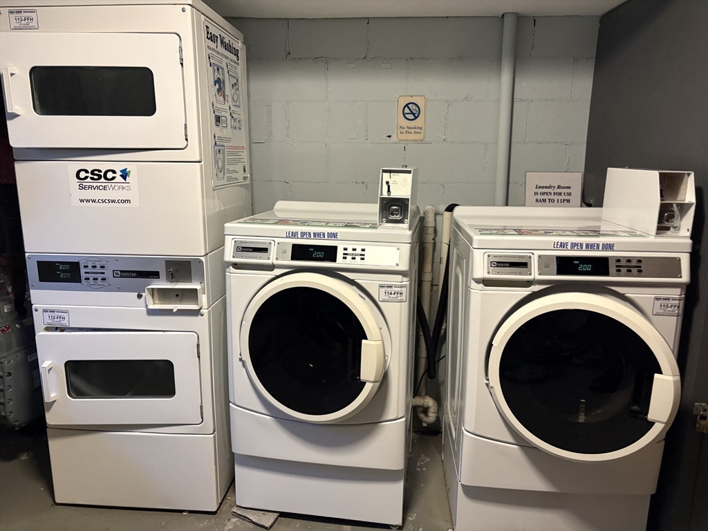 73 Walnut Street, Unit 6 Newton, MA 02460 - Photo 11 of 11 a utility room with dryer and washer