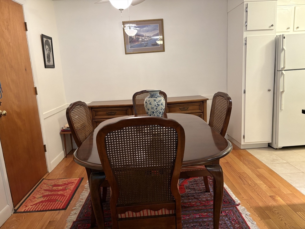 73 Walnut Street, Unit 6 Newton, MA 02460 - Photo 6 of 11 a view of a hallway with chairs
