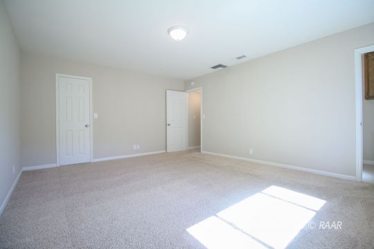 237 South American Street Ridgecrest, CA 93555 - Photo 19 of 26 an empty room with an entryway